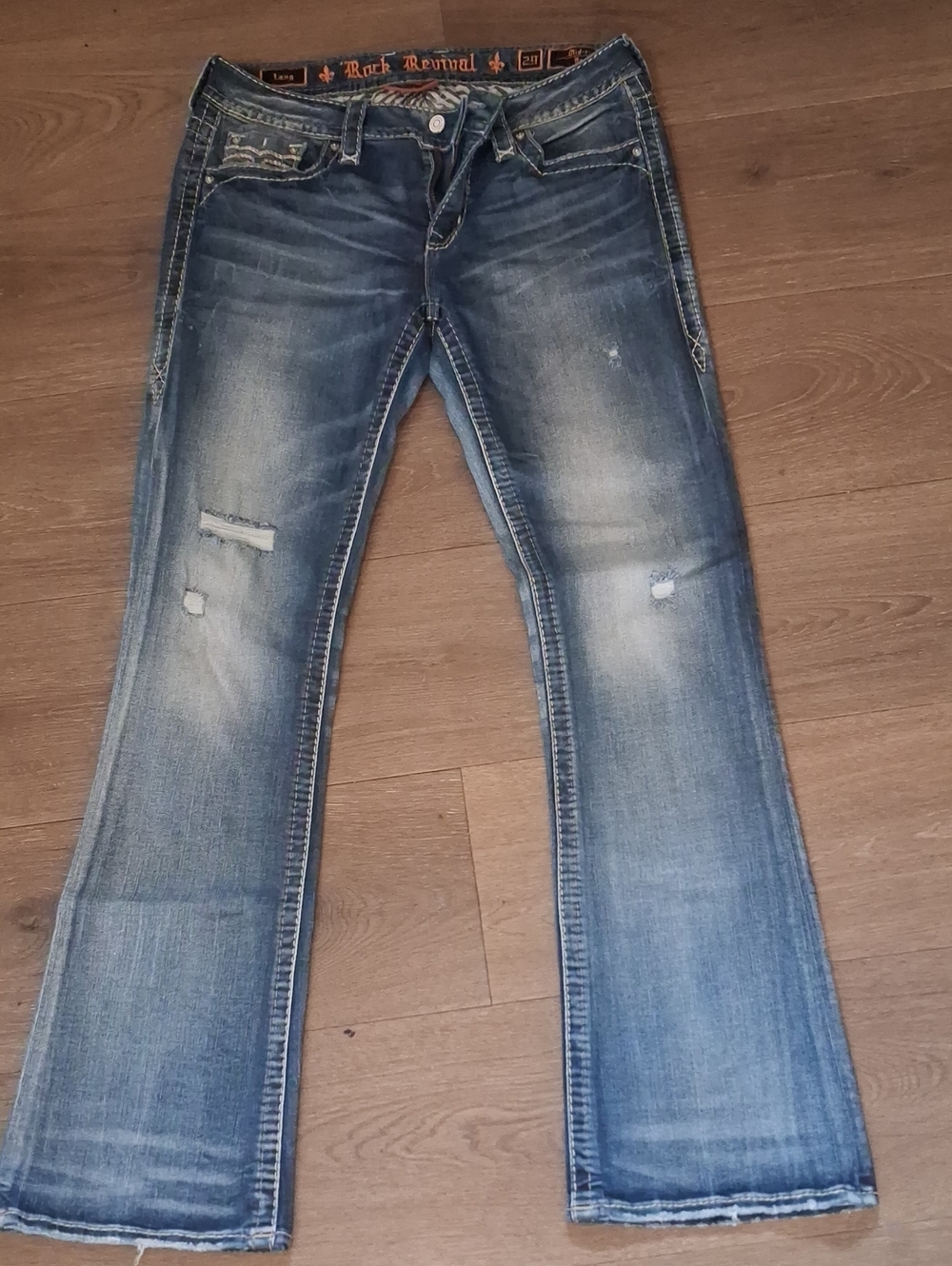 Rock Revival Women's Bootcut Jeans in Faded Blue with Light Distressing